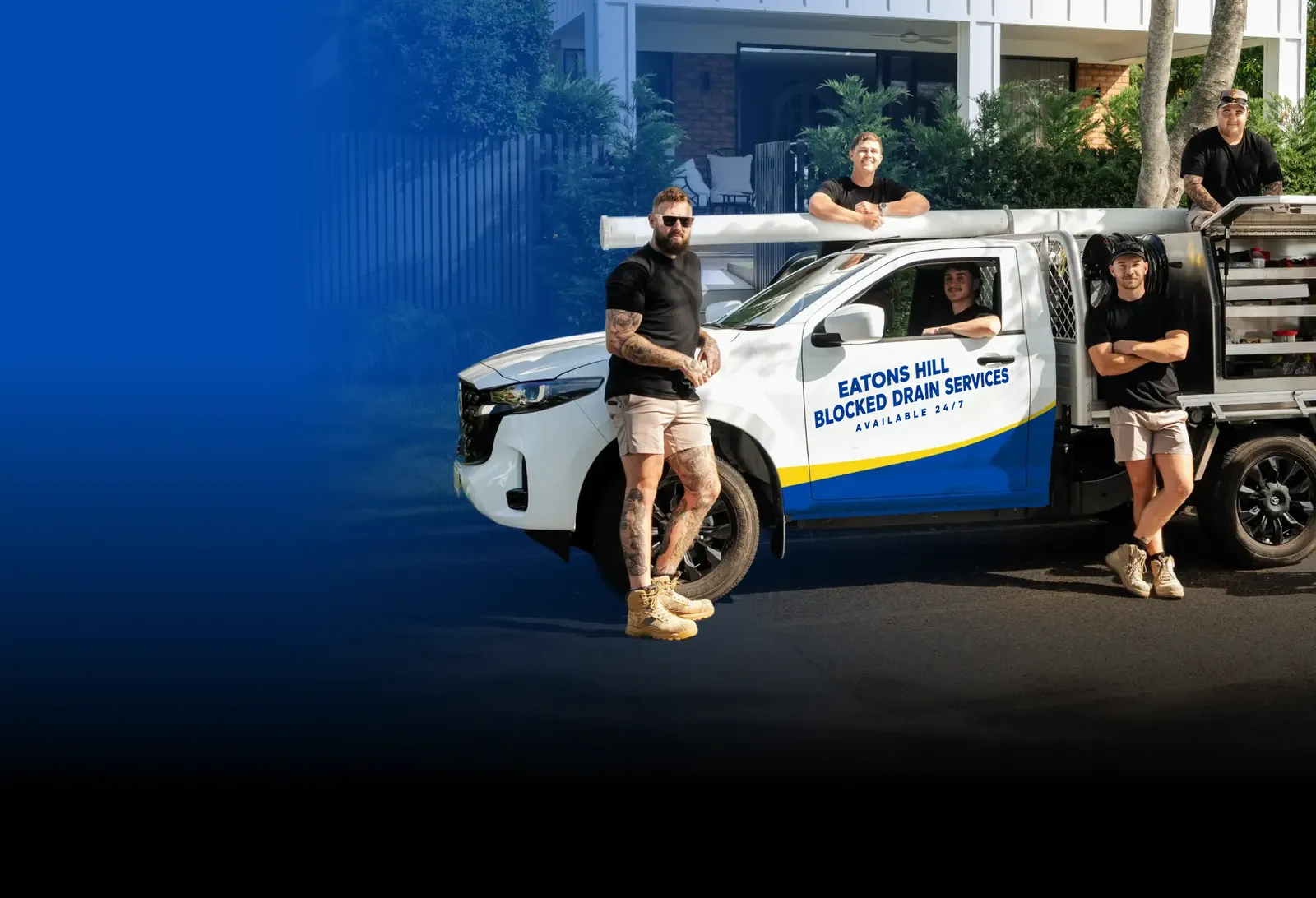 Eatons Hill Blocked Drain Services team with the ute